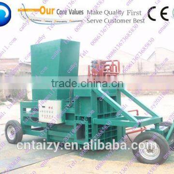 Hydraulic with wheel wood shaving baler machine