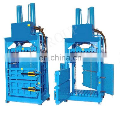 Vertical press baler machine for used clothing
