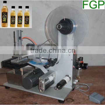 Semi automatic adhesive sticker labeling machine for plane surface