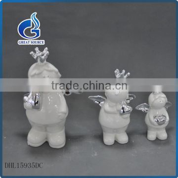 hot sale little christmas ceramic antique angel figurines with heart
