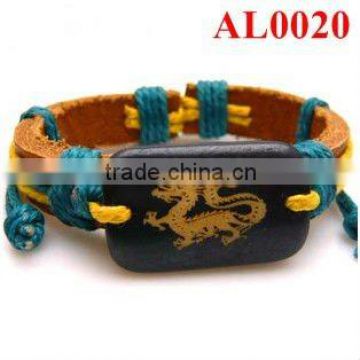 beautiful shiny colored handmade leather bracelet with an ox bone carved dragon patterns AL0020