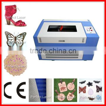 2015 hot selling wood arcylic leather fabric paper small laser engraving machine 6040