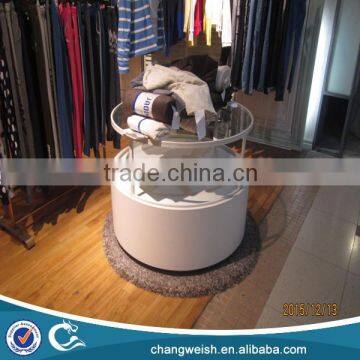round retail clothes display table