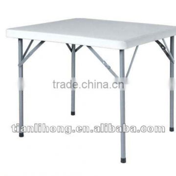 Blow molded folding outdoor plastic table