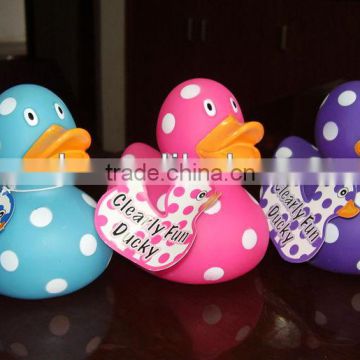 Speckled plastic duck with white dot