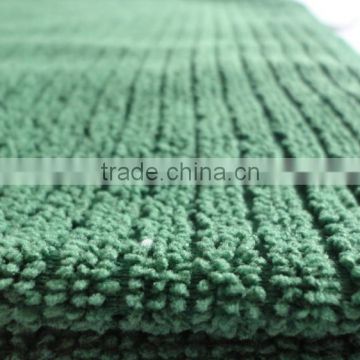 Warp knitted stripe cleaning material