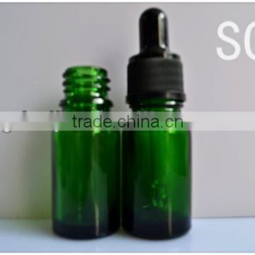 green glass dropper bottle