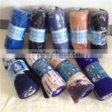 different styles of printed dog fleece throw