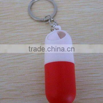 capsule shape plastic pill box with key chain