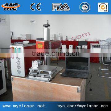 China manufacturer 20W 30W co2 Mini glass bottle engarving machine