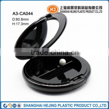 Round compact powder container with mirror
