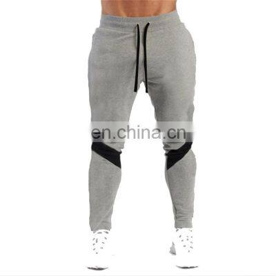 Wholesale cheap Breathable color block leggings men joggers pants for sportswear