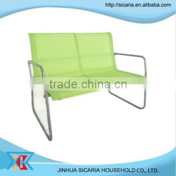 green fabric waiting chair
