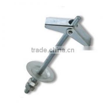 Cavity fixing spring toggle