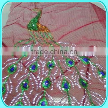 DOUBLE COLORS SEQUIN CLOTH GREEN on mesh fabric peacock designs