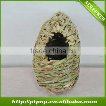 Hanging natural handmade eco-friendly wild bird house nest feeder made by plant leaves