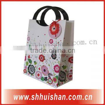 Cheap paper packing bag for gifts with fancy handle