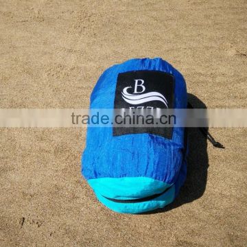 Easy Dry oversized beach blanket with adjustable strap
