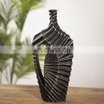 China manufacture high quality flower vase art decoration handmade black exquisite resin plant vases