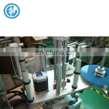 Labeling machine for egg carton top three sides