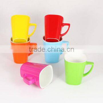 Glazed ceramic mugs and cups with bright colors