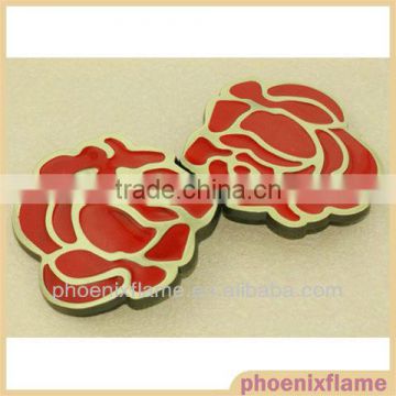 two red rose shape garment buckle