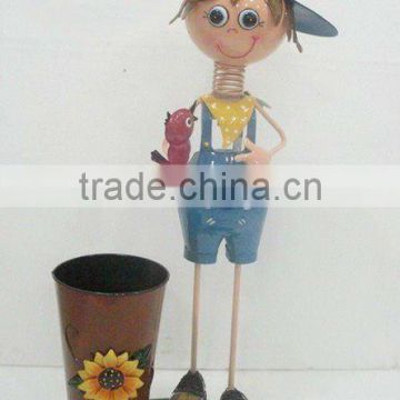 Decorative metal doll with flower pot for wholesale