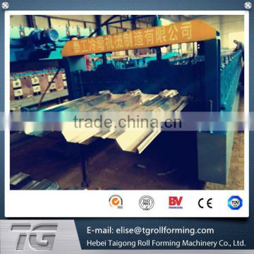 China price floor deck roll forming machine,steel decking floor roll forming machine,floor deck tile making roll