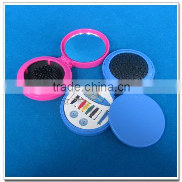 Plastic hair brush with sewing kits and mirror