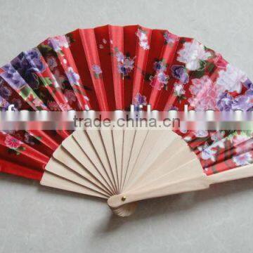 painted wooden rib with fabric spanish fan