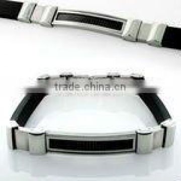 Stainless steel bracelet with rubber accents and black carbon fiber inlay