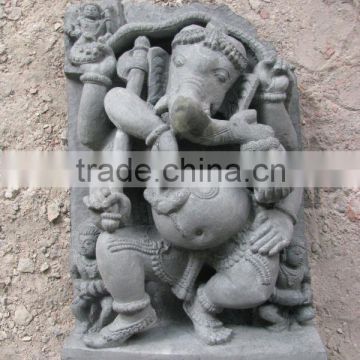 Stone dancing ganesh statue