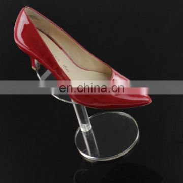 single standing clear acrylic shoe holder