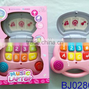 New kid toy funny Christmas music toy smart pink baby computer toy