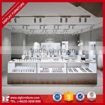 boutique makeup stand with lights for cosmetic shop counter design