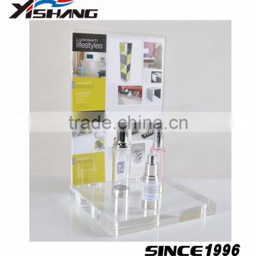 Acrylic cosmetic transparent display stand on table