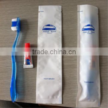 BLUE color one time toothbrush with small toothpaste