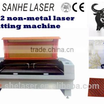Non-metal and hot sale in Europe 1610/1390 Co2 laser cutting machine for leather and cloth