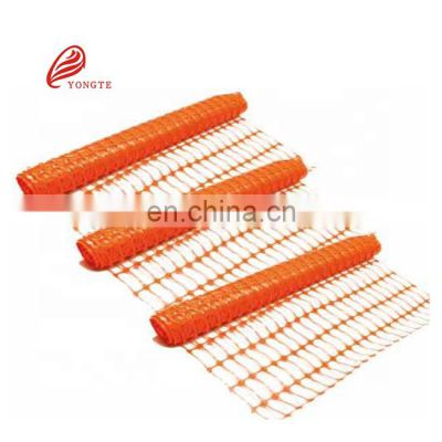 orange safety mesh net made of HDPE designed to mark and delimit areas in construction net