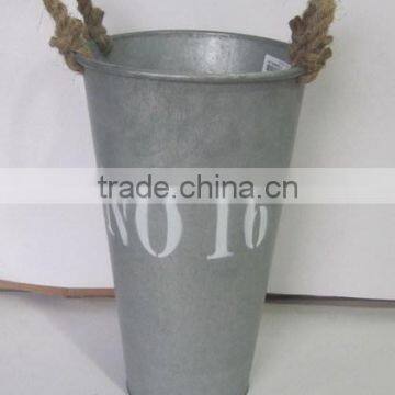 antique metal garden pot withrope handle