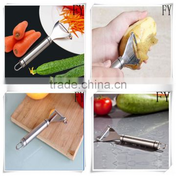 Hand held apple and potato peeler