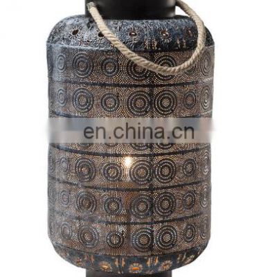 A beautifully decorated standard lamp with oriental flair