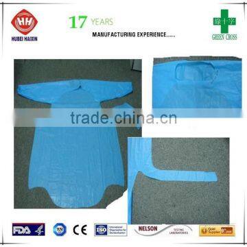 disposable CPE gown with open back and thumbs up hot seal