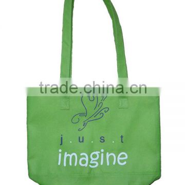 Cheap green recycle non-woven shopping bag with long handle