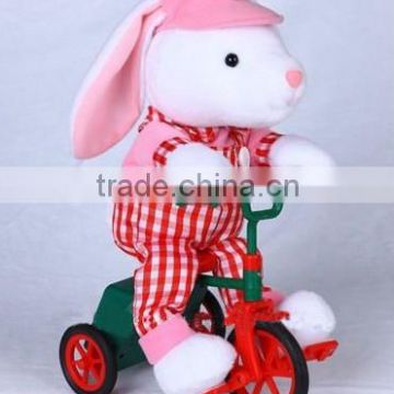 pink singing bunny in tricycle