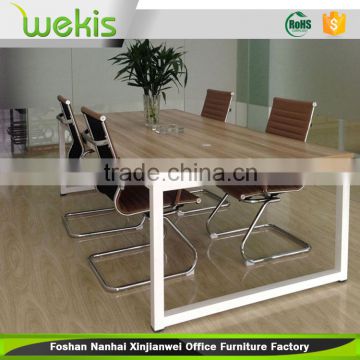 modern office meeting table design with white metal table legs