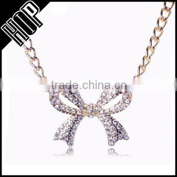 Best selling fashion metal gold plated crytsal bowknot pendant
