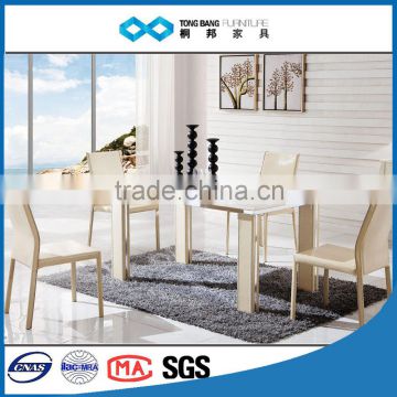beige color marble top dining table