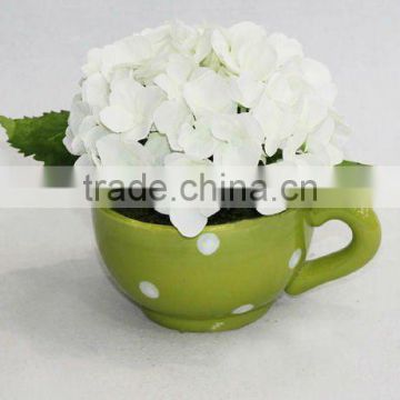 artificial white hydrangea in ceremic pot