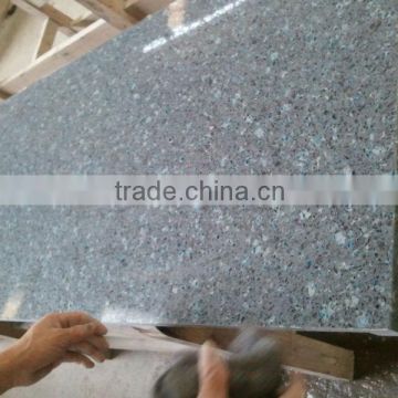 grey glowing well-polished quartz artificial stone countertop